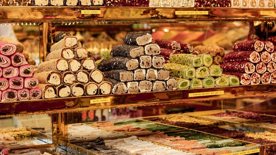 Assorted Turkish delight in vibrant colors on display in a shop.