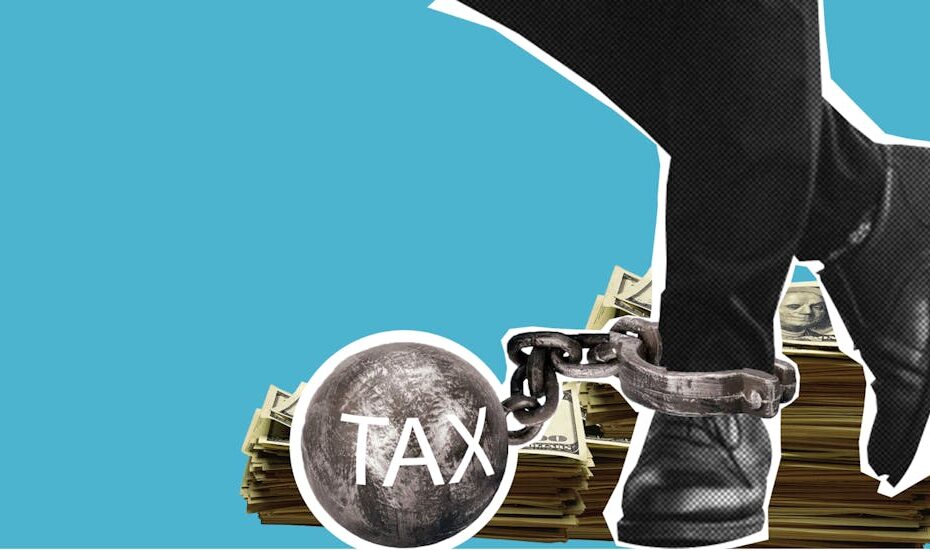 Illustration depicting a man shackled by "TAX," symbolizing financial burden on blue background.